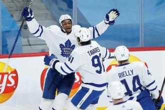 Toronto Maple Leafs players John Tavares, Wayne Simmonds, and Morgan Rielly
