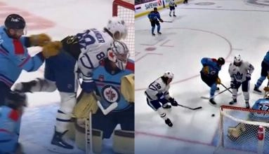 Toronto Maple Leafs forward William Nylander being pushed into Winnipeg Jets goalie Connor Hellebuyck