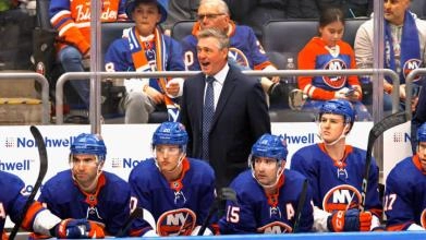 Patrick Roy behind the bench for the New York Islanders.