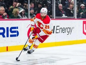The Calgary Flames Dillon Dube skating with his team during a game