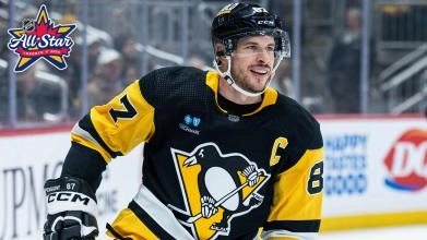 Pittsburgh Penguins 2024 All-Star Sidney Crosby skating up ice during an NHL game.