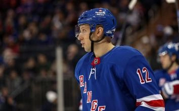 New York Rangers forward Nick Bonino in a home jersey