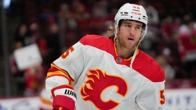 Calgary Flames defenseman Noah Hanifin warming up for a road game against the Chicago Blackhawks.