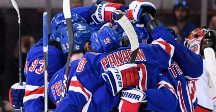 Rangers players celebrating a win