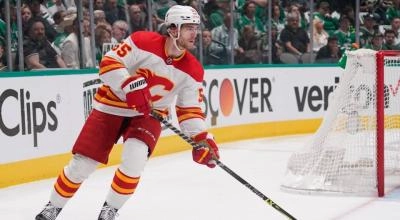 Calgary Flames defenseman Noah Hanifin skating in his defensive zone