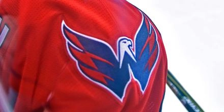 Close up image of the Washington Capitals Logo on the shoulder of a jersey.