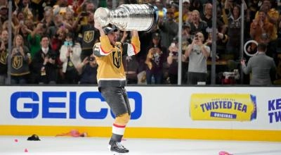 Reilly Smith hoisting the Stanley Cup for the Las Vegas Golden Knights.