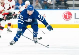 Toronto Maple Leafs defenseman Marshall Rifai skating with the puck against the Ottawa Senators