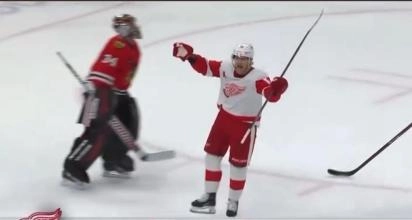 Patrick Kane celebrating an overtime victory against hiss former team, the Chicago Blackhawks