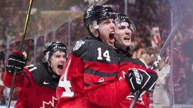 New Carolina Hurricane Maxim Comtois celebrating a goal scored at the World Junior Championships while playing for Canada.