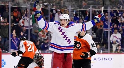 New York Rangers rookie Matt Rempe celebrating a goal against the Flyers