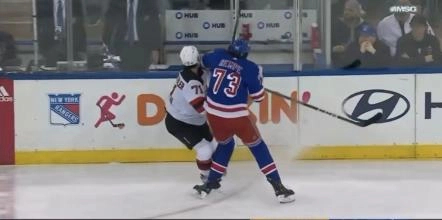 Matt Rempe hitting Jonas Siegenthaler in the head along the boards.