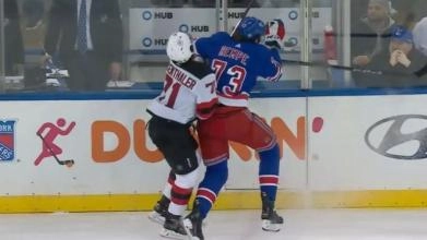 Matt Rempe landing a dirty hit on Jonas Siegenthaler in a game between the New Jersey Devils and the New York Rangers.