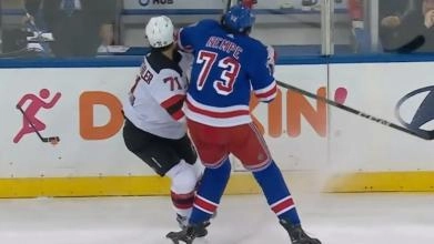Rangers rookie center Matt Rempe hitting Devils defenseman Jonas Siegenthaler in the head