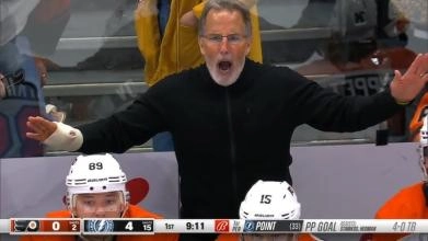 Philadelphia Flyers head coach John Tortorella yelling at referees before being ejected during a game against the Tampa Bay Lightning in the NHL.