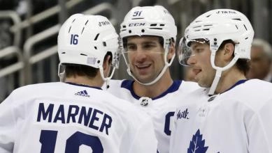 Calle Jarnkrok skating up the ice for the Toronto Maple Leafs during a game.