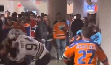 Edmonton Oilers fans in a brawl after a game against the Montreal Canadiens.