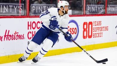 TJ Brodie skates during a Toronto Maple Leafs game.