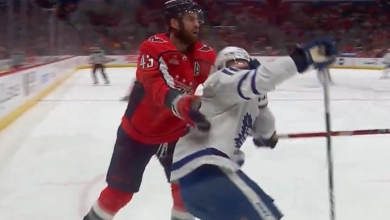 Tom Wilson of the Washington Capitals tries to plead his case with the referee after a brutal high stick