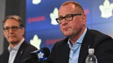 Toronto Maple Leafs General Manager Brad Treliving addressing the media
