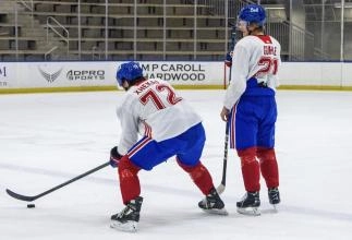 Kaiden Guhle and Arber Xhekaj on the ice during a Montreal Canadiens' practice.
