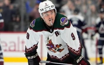 Arizona Coyotes forward Clayton Keller preparing for a faceoff