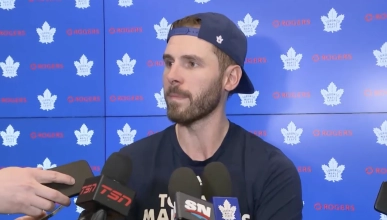 Joel Edmundson during a post-game press conference for the Toronto Maple Leafs.