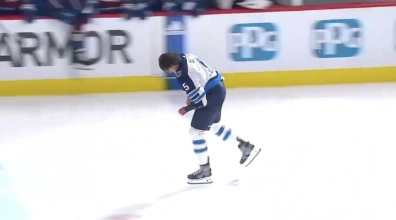 Brendon Dillon skating off the ice with a hand injury after the game.