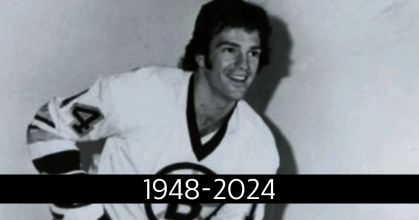 Former Boston Bruins player Dave Forbes, with the years 1948-2024