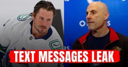 J.T. Miller of the Vancouver Canucks on the ice with the team's head coach Rick Tocchet in a press conference.