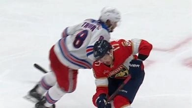 Jacob Trouba elbowing Evan Rodrigues