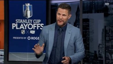 NHL analyst Kevin Bieksa speaking on a Sportsnet panel during the Stanley Cup Playoffs.