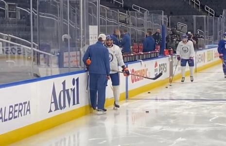 Evander Kane and Kris Knoblauch talking during the Edmonton Oilers practice.