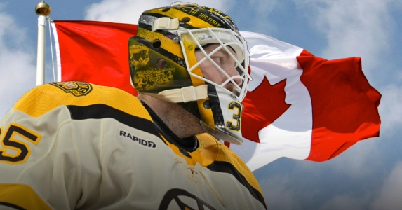 The Boston Bruins goaltender Linus Ullmark with a Canadian flag.
