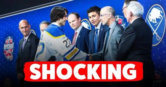Buffalo Sabres prospect Matt Savoie shaking hands with Buffalo Sabres staff before being traded to the Edmonton Oilers