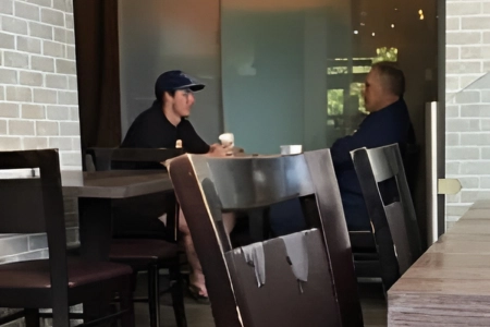 Toronto Maple Leafs forward Mitch Marner (left) meeting with Maple Leafs new head coach Craig Berube (right) at a coffee shop after Craig Berube was hired.