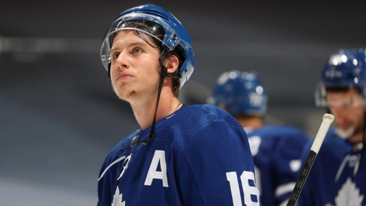 Mitch Marner of the Toronto Maple Leafs looks skyward during practice
