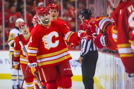 Calgary Flames forward Nazem Kadri celebrating goal with Flames bench