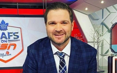 Carlo Colaiacovo behind the desk for TSN