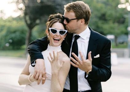 Toronto Maple Leafs defenseman Morgan Rielly with his wife Tessa Virtue on their wedding day.