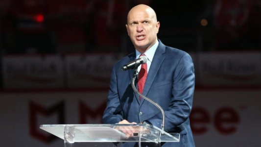 John Walton seen making a speech