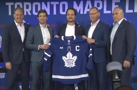 Auston Matthews accepting the captaincy from John Tavares