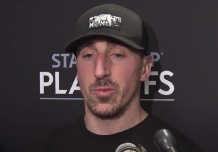 Boston Bruins captain Brad Marchand speaking to the media