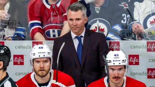 Martin St. Louis behind the bench with the Montreal Canadiens