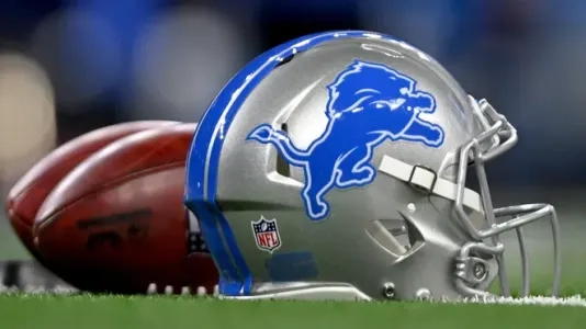 Detroit Lions helmet with a football