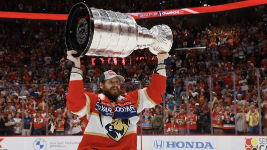 Oliver Ekman-Larsson with the Florida Panthers lifts the Stanley Cup
