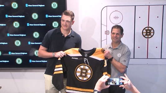 Nikita Zadorov after signing with the Boston Bruins