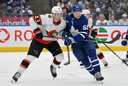 Sep 22, 2024; Toronto, Ontario, CAN; Ottawa Senators defenseman Tyler Kleven (43) covers Toronto Maple Leafs forward Easton Cowan (53) in the third period at Scotiabank Arena. Mandatory Credit: Dan Hamilton-Imagn Images