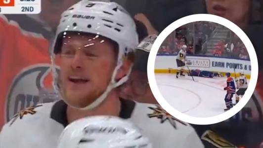 Jack Eichel sends Mattias Ekholm crashing into the boards.