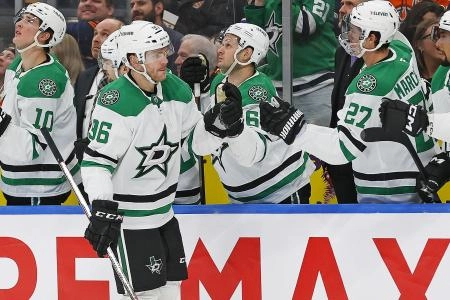 Mar 8, 2025; Edmonton, Alberta, CAN; The Dallas Stars celebrate a goal by forward forward Mikko Rantanen (96) during the third period against the Edmonton Oilers at Rogers Place. Mandatory Credit: Perry Nelson-Imagn Images